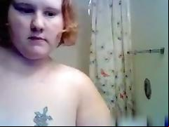 Superfat redhead chick takes a shower